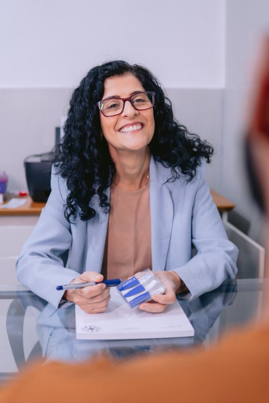 Dra. Claudia Pavão, especialista em Ortodontia e Prótese Dentária
